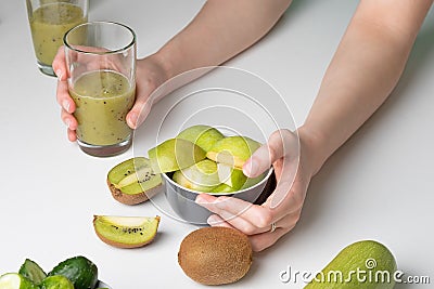 Fruit smoothie in hands teenager. Healthy eating in smoothie concept Stock Photo