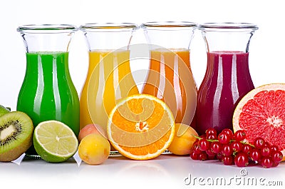 Fruit smoothies in different colours with fruits Stock Photo