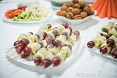 Fruit sticks with grapes,apple, melon, pear Stock Photo