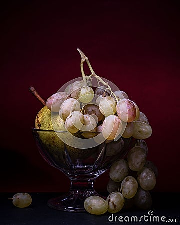 Fruit, still life food grapes pear bowl delicious Stock Photo