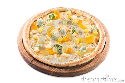 Fruit sweet pizza with banana, grapes and mint Stock Photo