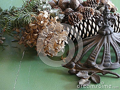 A Wabi Sabi Forager`s Table with Antiquities and Natural Elements like Pine Cones and Dried Hydrangea Flowers Stock Photo