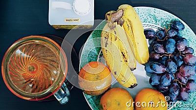 Fruits banana grapes oranges Stock Photo