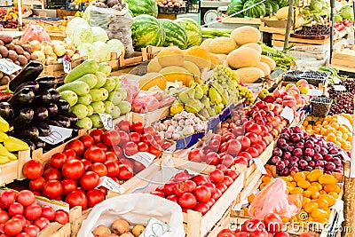 Fruits, berries and vegetables on the counter at the street market Stock Photo