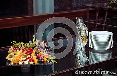 Fruits and drinks served on table Stock Photo