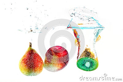 Fruits falling in the water Stock Photo