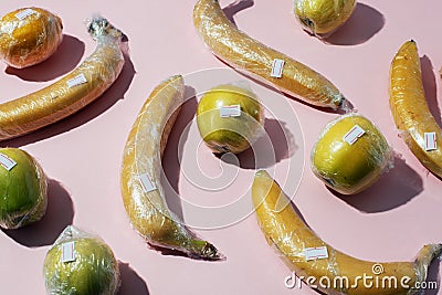 Fruits in plastic packaging, pollution of earth concept, supermarket packaging, Concept of ecology problem, no plastic, zero waste Stock Photo