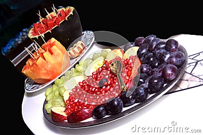 Fruits variety . black plum , Pomegranate . apple , grapes . Stock Photo