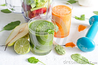 Fruits, vegetables, juice, smoothie and dumbell health diet and fitness Stock Photo