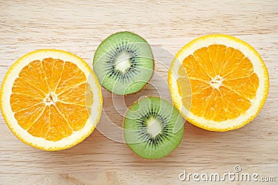 Fruity background set of slices of orange fruit and kiwi Stock Photo