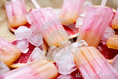 Fruity pink popsicles Stock Photo