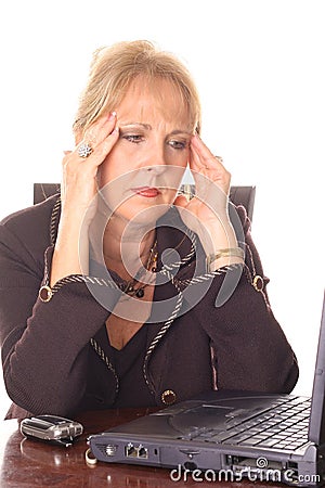 Frustrated business woman with a headache Stock Photo