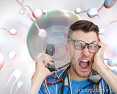 Frustrated computer engineer screaming while on call in front of open cpu Stock Photo