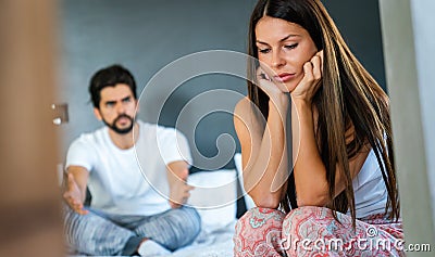 Frustrated couple arguing and having marriage problems Stock Photo