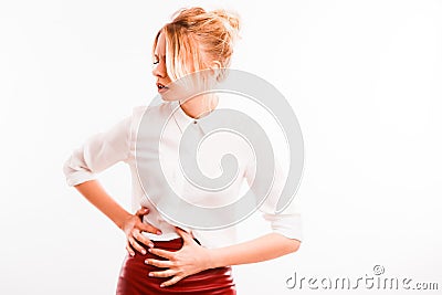 Frustrated girl suffering from head ache. Upset young woman with pain grimace holding head. Headache or loss concept Stock Photo