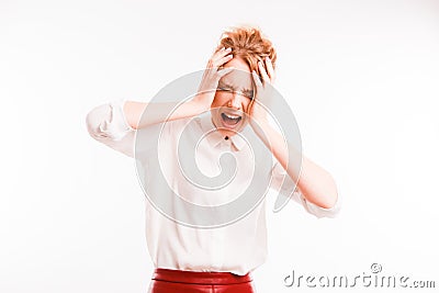 Frustrated girl suffering from head ache. Upset young woman with pain grimace holding head. Headache or loss concept Stock Photo