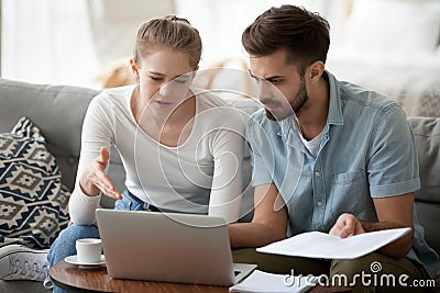 Frustrated married couple has financial problems received bad ne Stock Photo