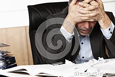Frustrated office manager overloaded with work. Stock Photo