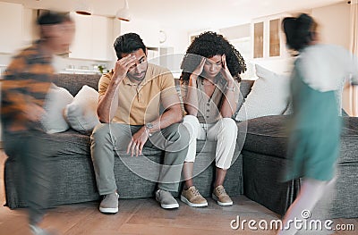 Frustrated parents, headache and children with stress in burnout, anxiety or depression in living room chaos at home Stock Photo