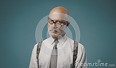 Frustrated serious businessman with crooked glasses Stock Photo