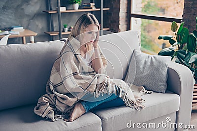 Frustrated and sick woman took a day off work and stayed at home Stock Photo