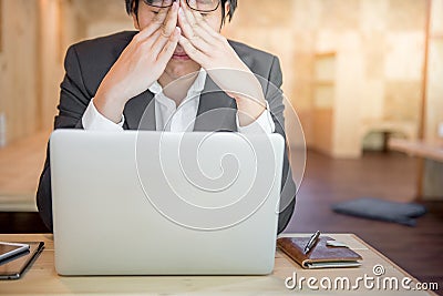 Frustrated stressed business man in workplace Stock Photo