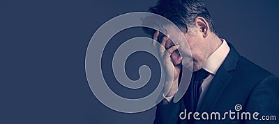 Frustrated and stressed businessman feeling depressed after fail Stock Photo