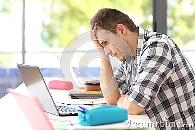 Frustrated student on line in classroom Stock Photo