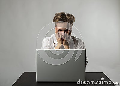 Frustrated and tired young man in white Stock Photo