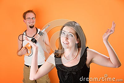 Frustrated woman and incompetent handyman Stock Photo