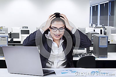 Frustrated worker in the office Stock Photo