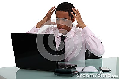 Frustrated young businessman Stock Photo