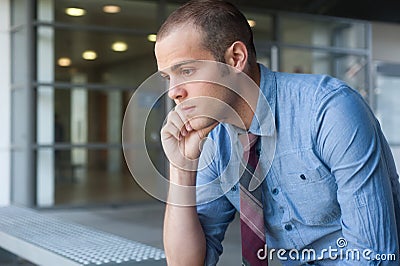 Frustrated young, handsome businessman Stock Photo