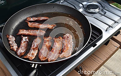 Frying bacon Stock Photo