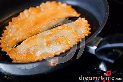 Frying hotcakes Stock Photo