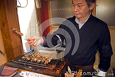 Frying oysters, Miyajima, Japan Editorial Stock Photo