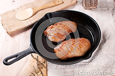 Frying pan with cooking duck breast Stock Photo