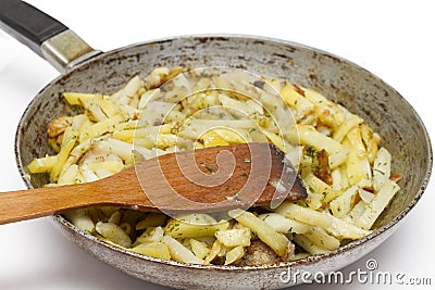 Frying pan with fried potatoes. Stock Photo