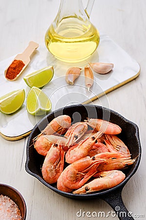 Frying pan with steamed unpeeled shrimps Stock Photo