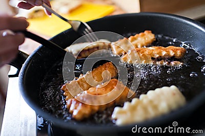 Frying pies on pan Stock Photo