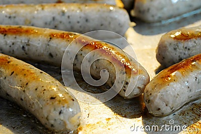 Frying sausages Stock Photo