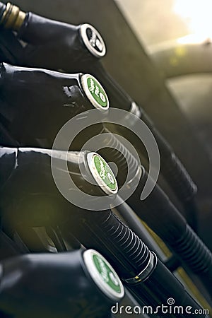 Fuel pistols close up at the gas station. Stock Photo