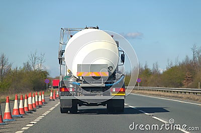 Fuel tanker on dual carriageway Stock Photo