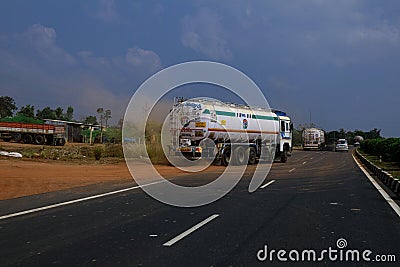 A fuel tanker getting on the national highway Editorial Stock Photo