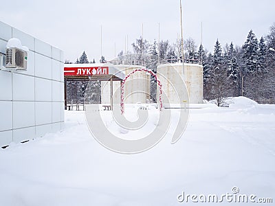 Fuel tanks at Lukoil gas stations on a winter day. Editorial Stock Photo