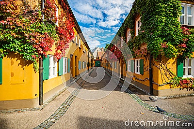 Fuggerei housing complex in Augsburg, Germany Stock Photo