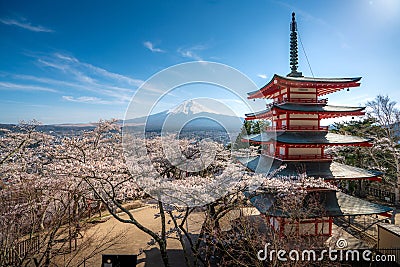 Fujiyoshida, Japan at Chureito Pagoda and Mt. Fuji in the spring with cherry blossoms full bloom during sunrise. Japan Landscape Stock Photo