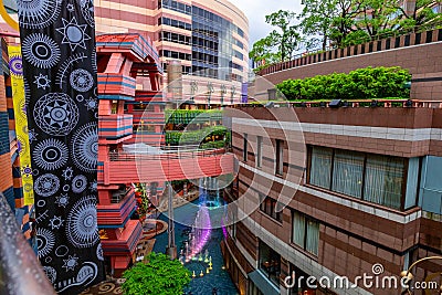 View inside of the Canal City Hakata shopping mall shows part of the mall building design on a rainy evening Editorial Stock Photo