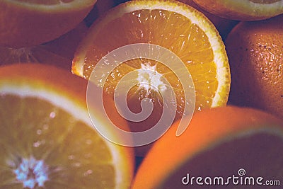 Full Background Frame Of Halves Of Ripe Oranges Lying Randomly On Top Of Each Other Stock Photo