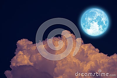 Full Beaver Moon back dark orange cloud on night sky Stock Photo